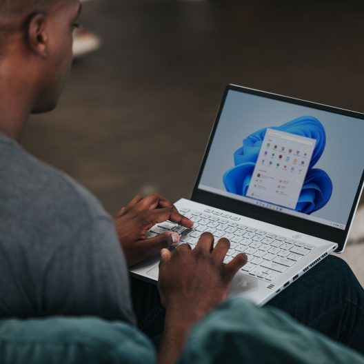 Windows 11 man on laptop