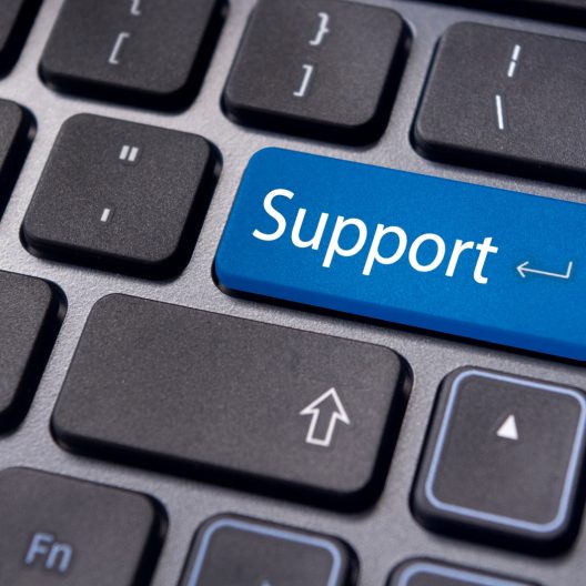 Outsourced IT Support. Support highlighted on keyboard.