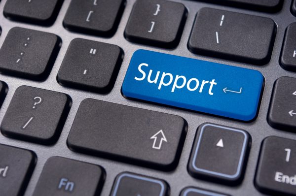 Outsourced IT Support. Support highlighted on keyboard.